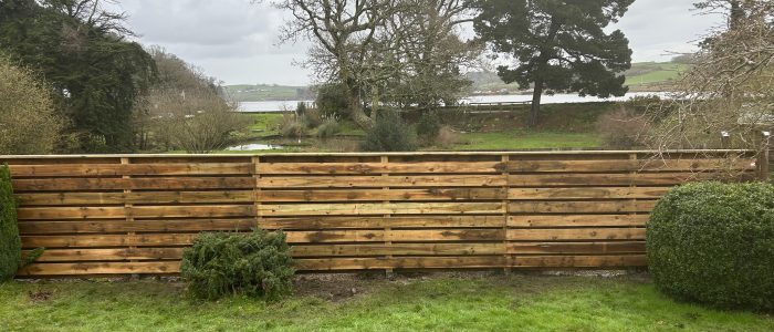 Horizontal hit and miss fencing at a low height to allow for views of trees and fields